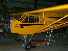 Image of Piper Cub before and aftter restoration
